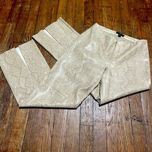 Fabulous BCBG faux leather snake print flare pants